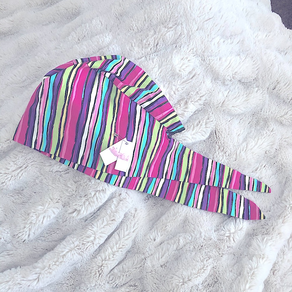 Scrub cap with pink stripes and bunny buttons